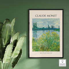 Monet Banks of the Seine Vétheuil River Landscape Art Print Poster framed on a green wall with foliage.