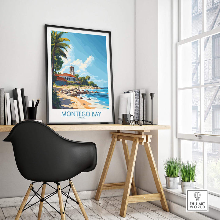 Montego Bay travel poster displayed in a stylish home office setting with a black chair and bright sunlight.