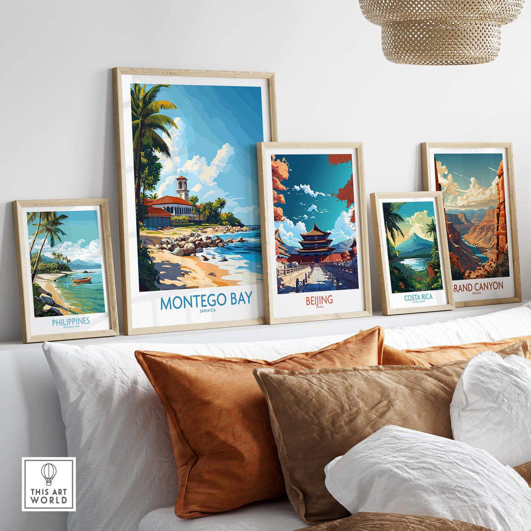 Montego Bay travel poster displayed among other travel posters on a stylish couch, showcasing vibrant tropical art.