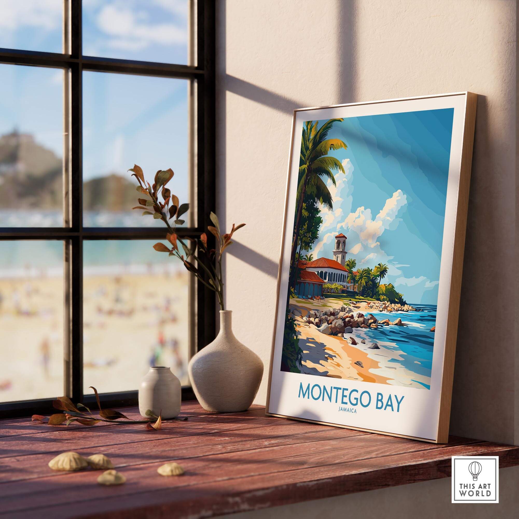 Montego Bay Travel Poster displayed on a table with a beach view, featuring vibrant colors and tropical scenery.