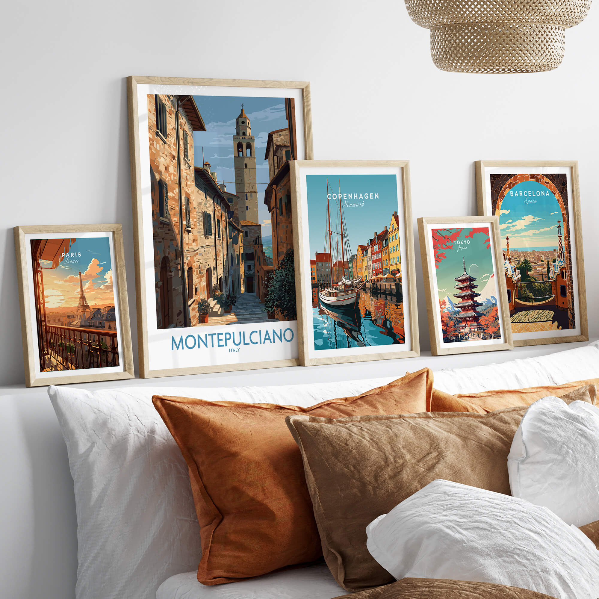 Montepulciano Italy Poster | Tuscany Canvas Print displayed among travel-themed art frames on a cozy couch.