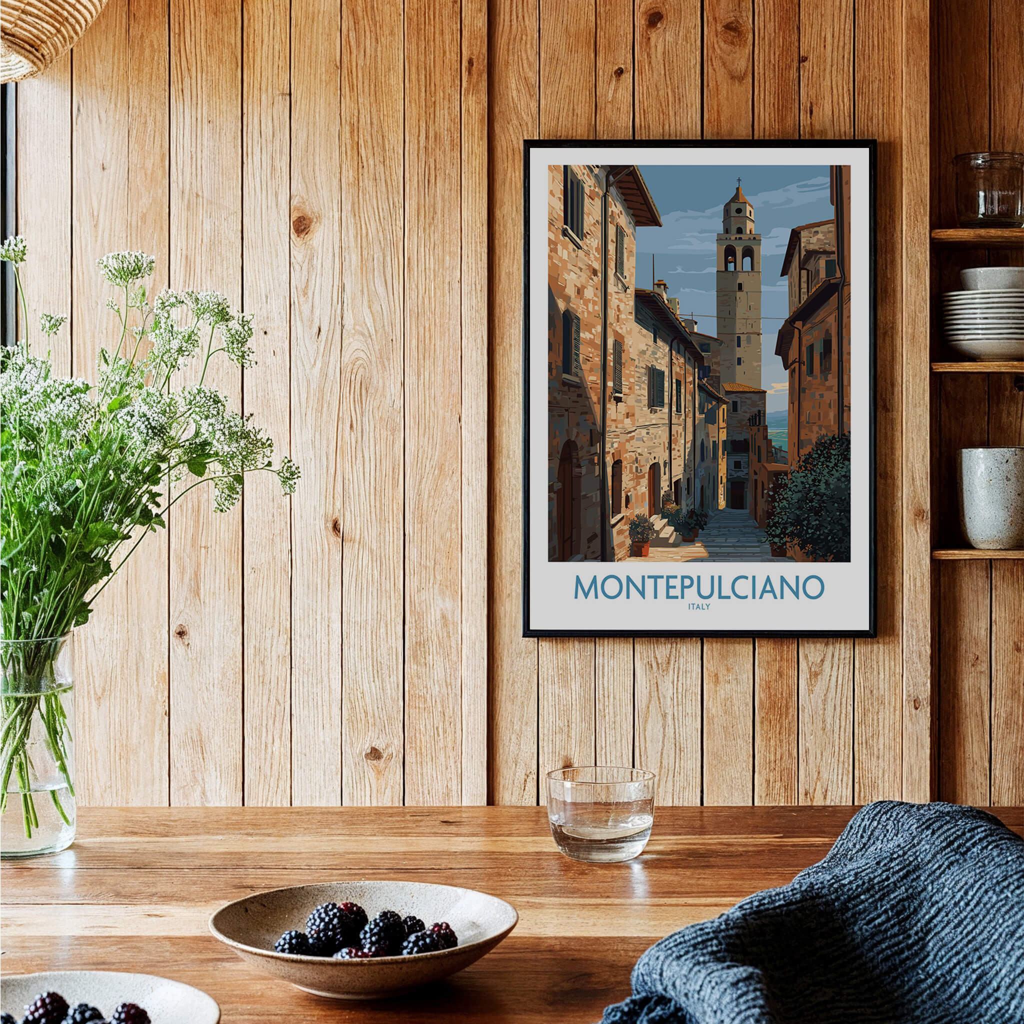Montepulciano Italy Poster | Tuscany Canvas Print framed on wooden wall with plants and table decor.