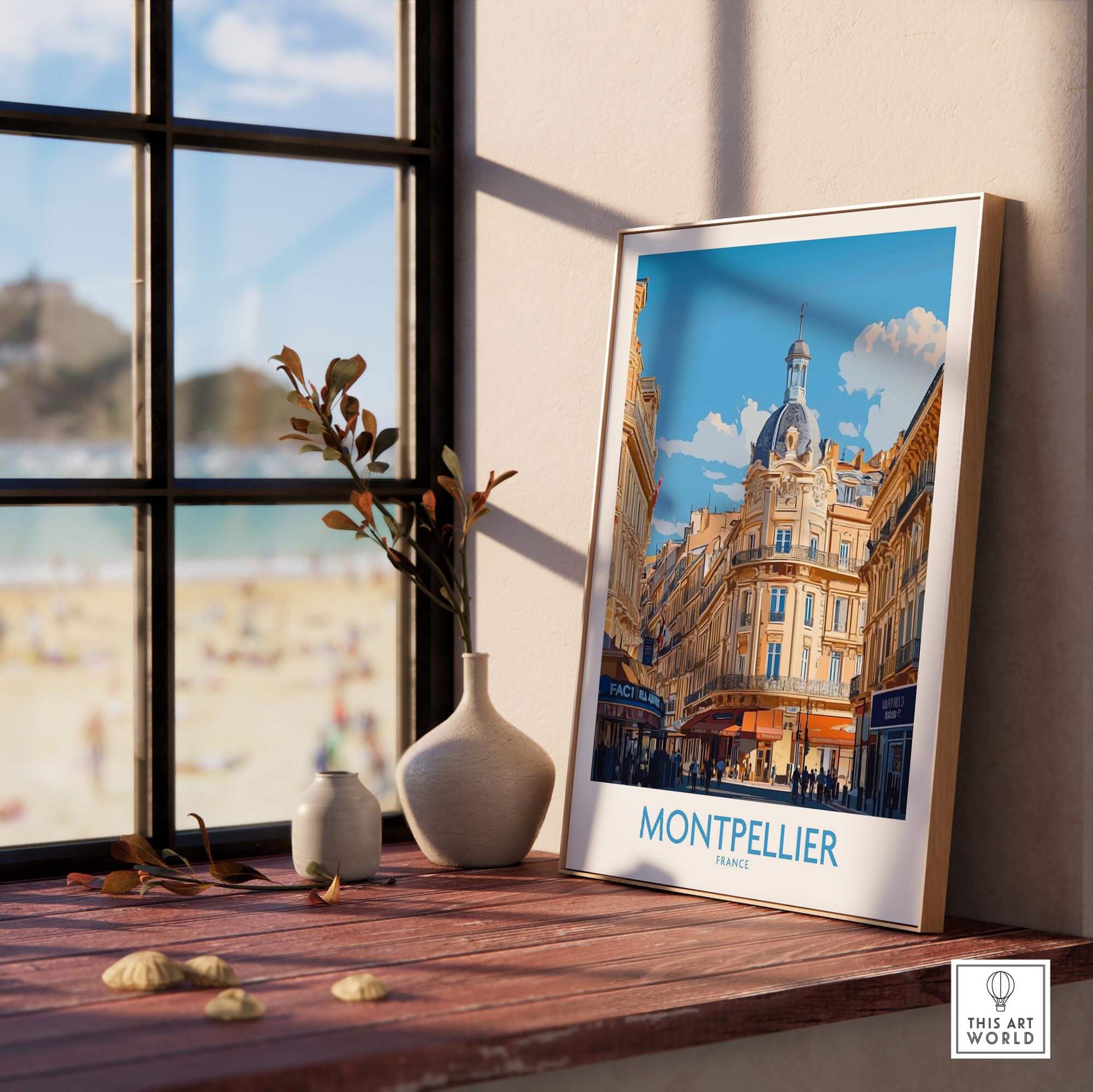 Montpellier Poster France beautifully displayed on a windowsill with serene beach view in the background.