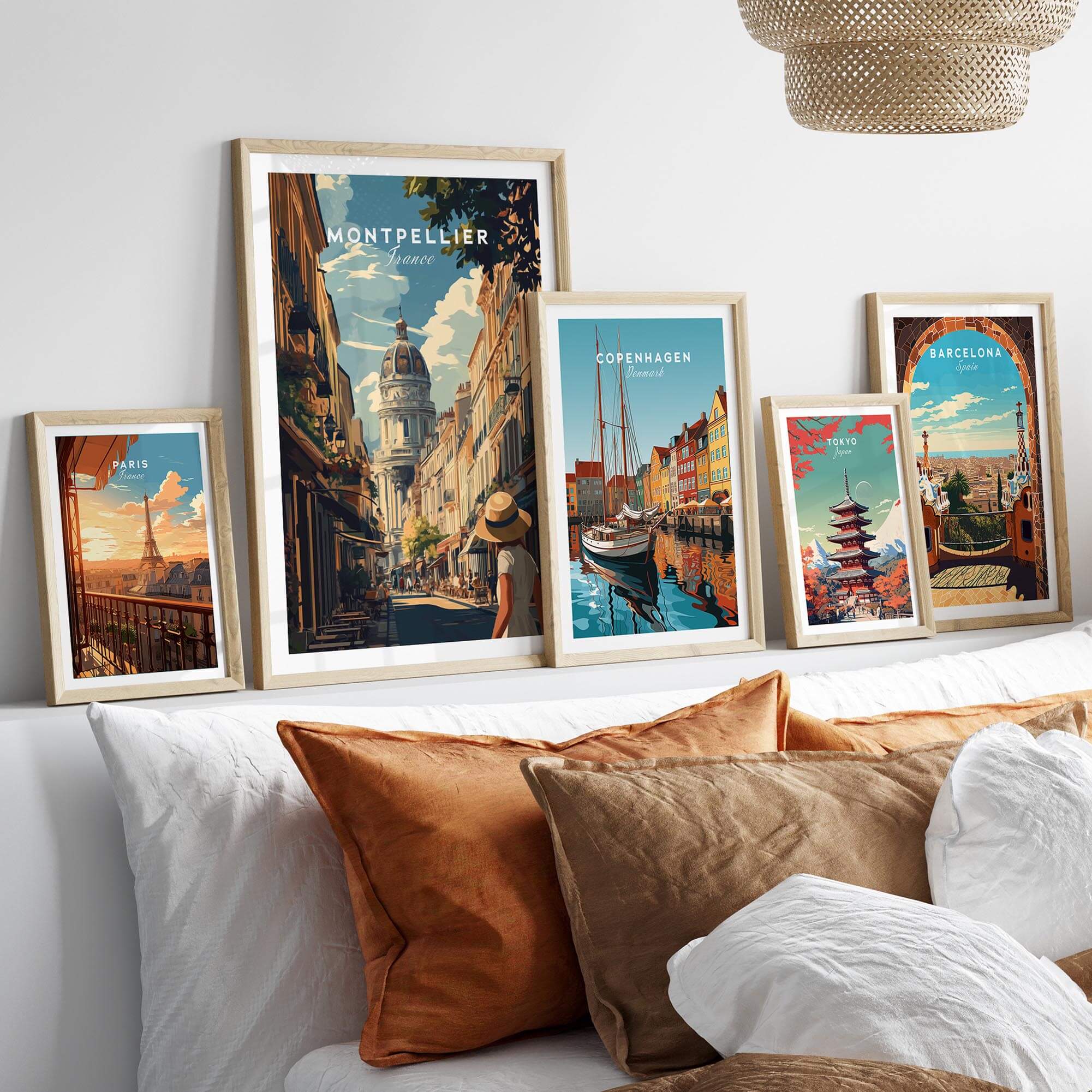 Montpellier Wall Art displayed on a wall among framed travel prints, enhancing home decor with vibrant colors.
