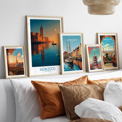 Morocco Poster | North African Cityscape Sunset Canvas Print displayed on a cozy bed with decorative pillows.