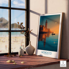 Morocco Poster | North African Cityscape Sunset Canvas Print displayed on a windowsill with a beach view.