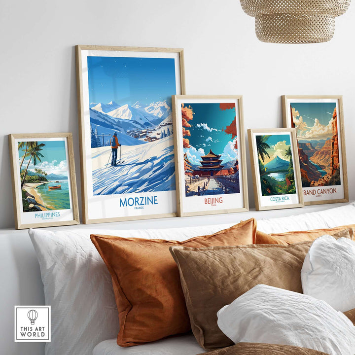 Morzine wall art displayed among travel-themed framed prints on a stylish living room shelf.