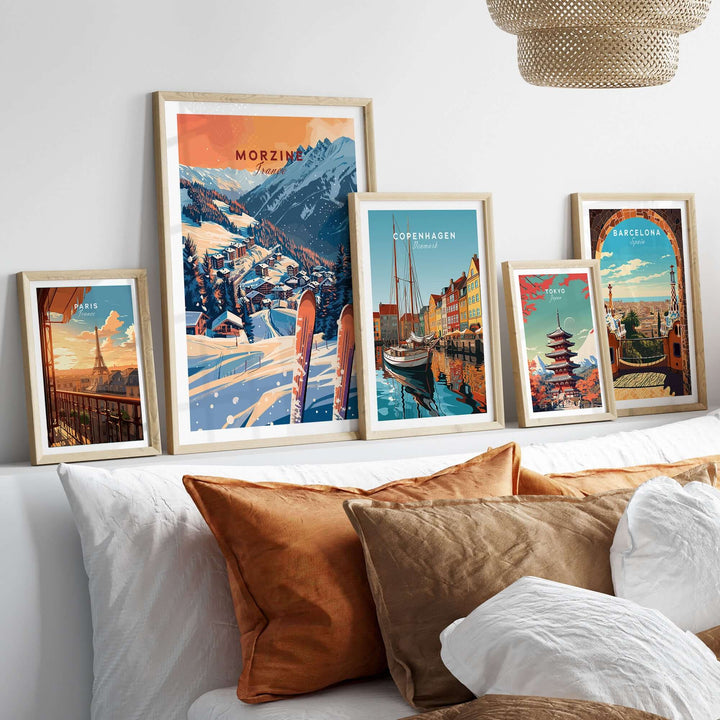 Framed Morzine ski poster wall art print displayed among travel art prints on a shelf.