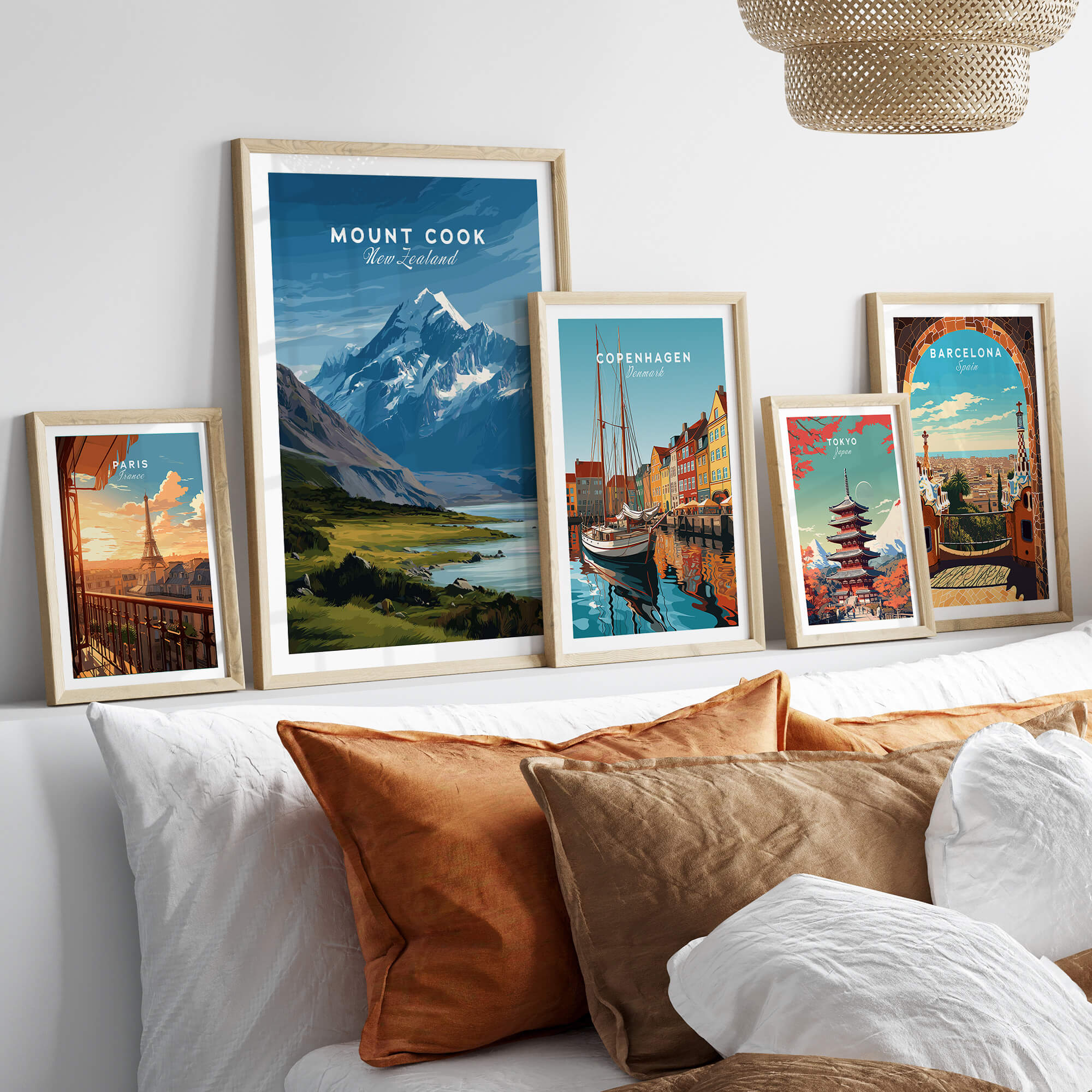 Mount Cook New Zealand Wall Art Print | Snow Capped Summit Travel Poster displayed with other framed travel posters.