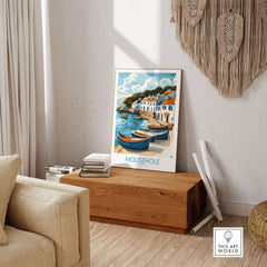Mousehole Travel Poster Cornwall displayed in a cozy living room, showcasing the scenic fishing village and coastal charm.