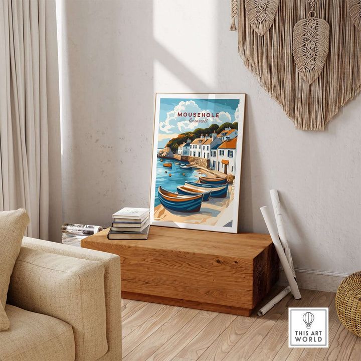 Mousehole Travel Print featuring a scenic view of Cornwall's fishing village, displayed in a cozy coastal-themed home setting.