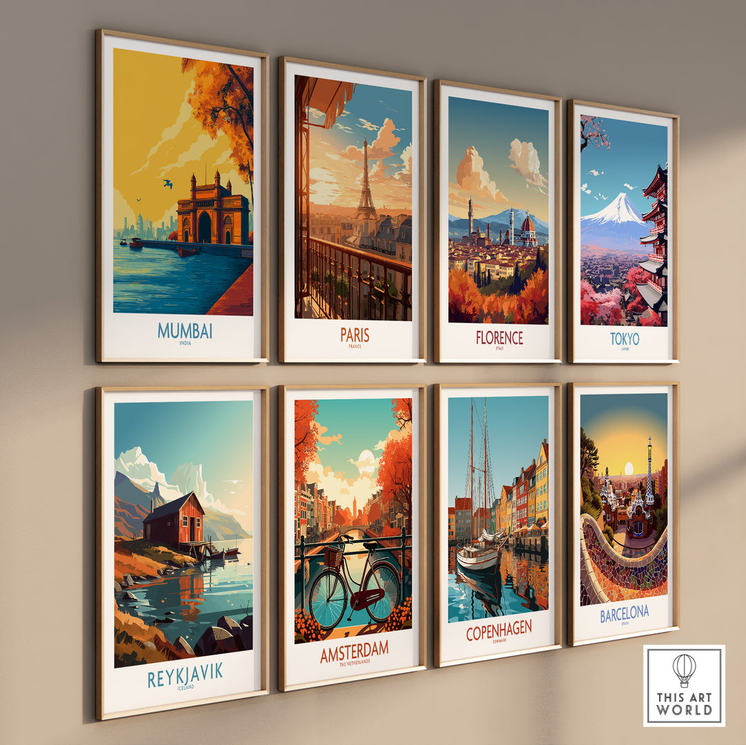 Gallery wall featuring vibrant travel art prints of Mumbai, Paris, Florence, Tokyo, Reykjavik, Amsterdam, Copenhagen, and Barcelona.