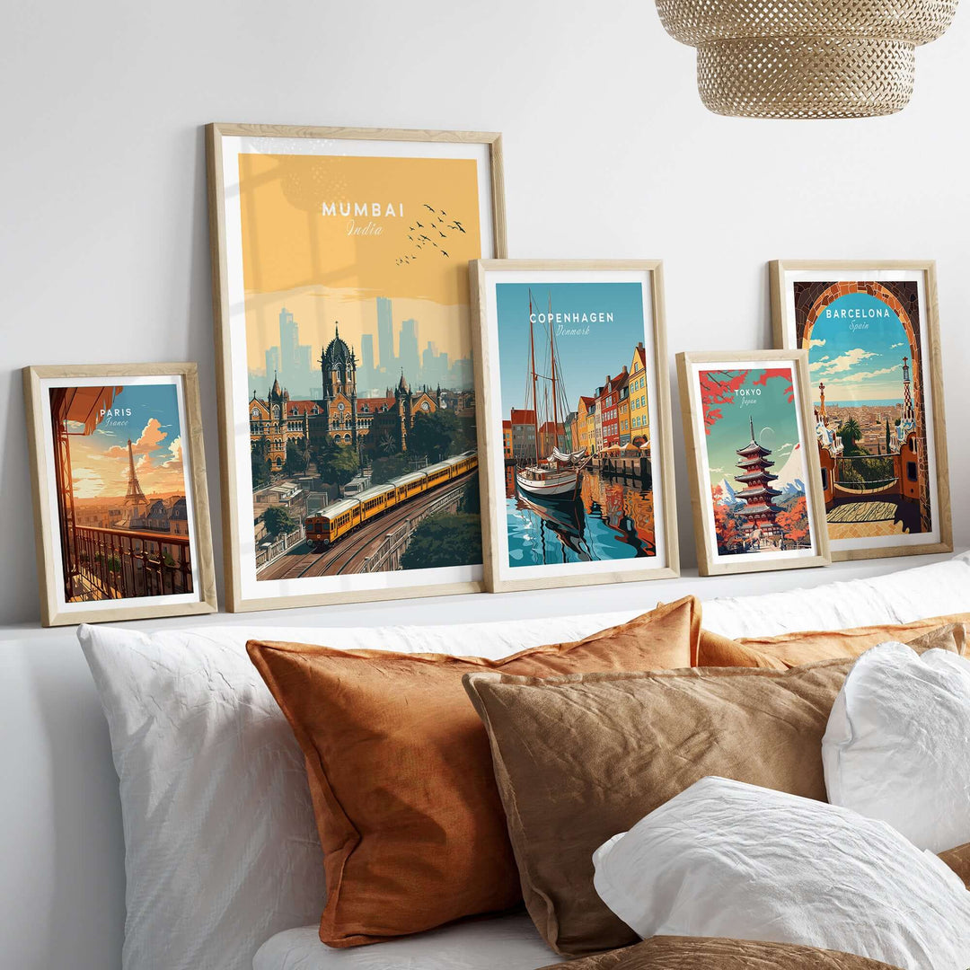 Framed city posters featuring Mumbai skyline, Copenhagen, and Barcelona on a stylish living room wall.