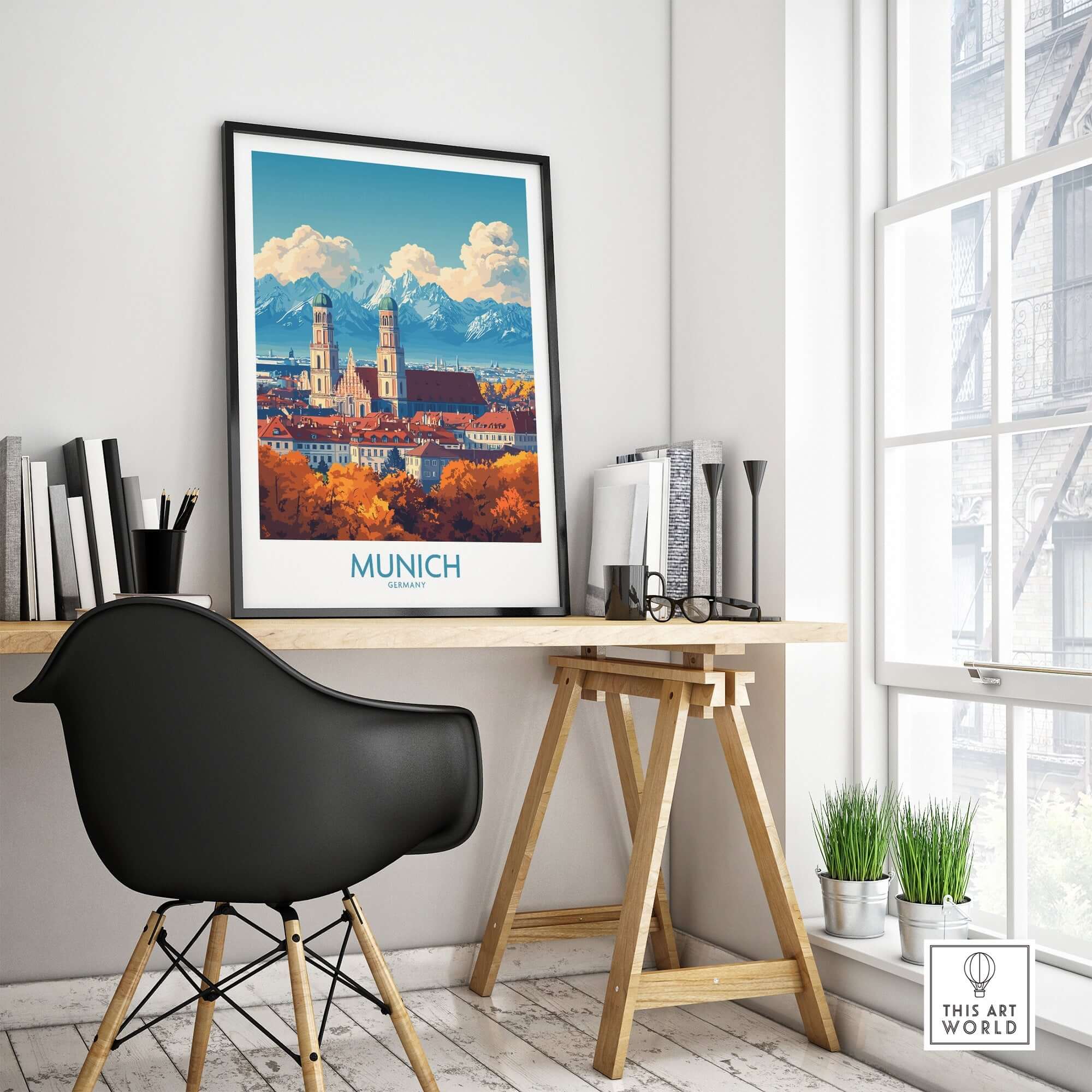 Munich Travel Poster displayed in a stylish workspace, highlighting the city's vibrant colors and iconic landmarks.