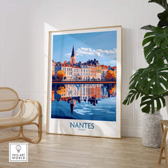 Nantes Poster France displayed in a modern interior with reflections of colorful buildings and a plant.