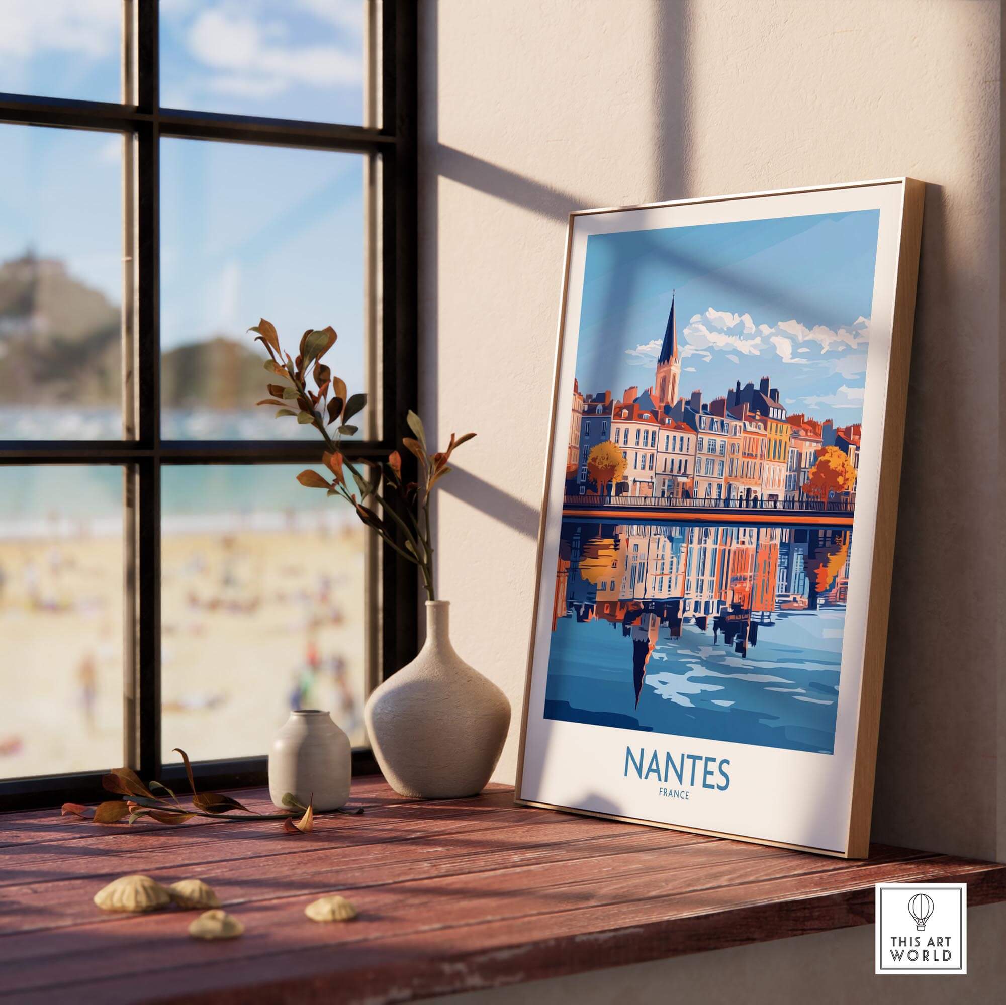 Nantes Poster France displayed in a bright interior setting with a view of the beach and plants.