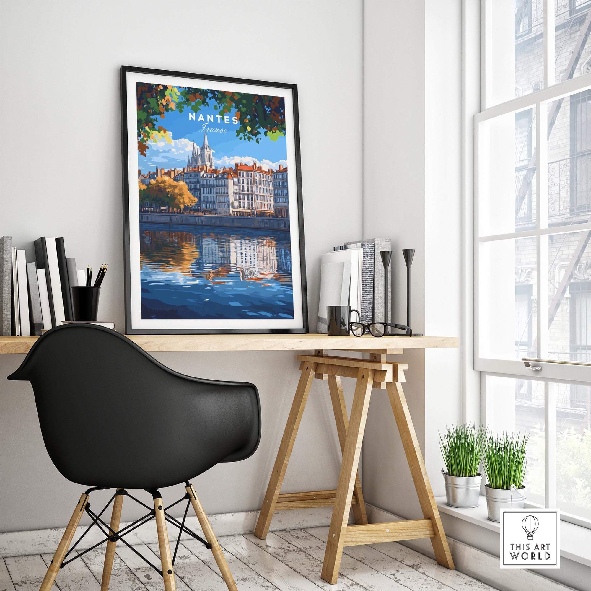 Nantes Travel Print showcasing a vibrant illustration of Nantes with its picturesque river in a stylish modern workspace.