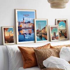 Nantes Wall Art Print displayed among other travel posters on a stylish wall, enhancing modern home decor.