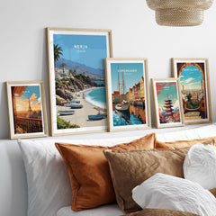 Nerja Spain Travel Poster | Sunny Spanish Coast Wall Art Print displayed on a stylish couch with decorative cushions.