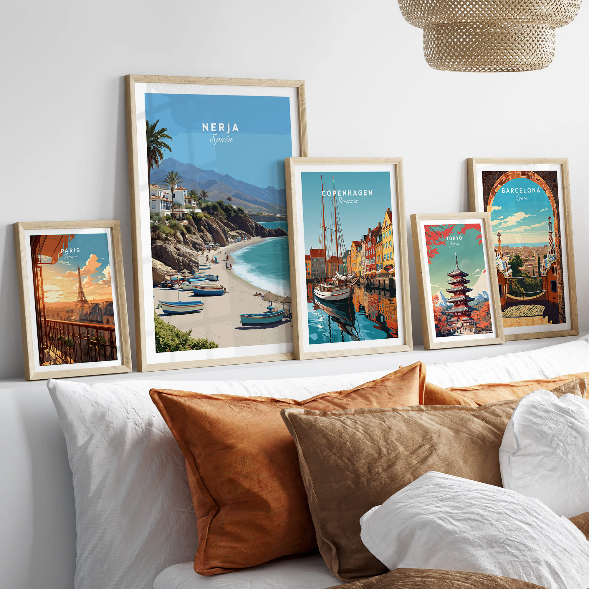 Nerja Spain Travel Poster | Sunny Spanish Coast Wall Art Print displayed on a stylish couch with decorative cushions.