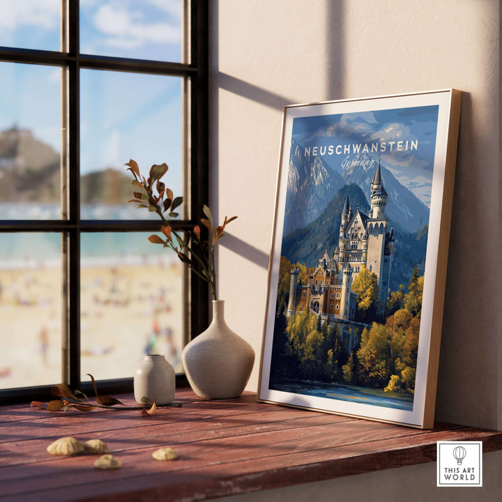 Neuschwanstein Castle Print | German Home Decor Poster displayed on a wooden table by a window.