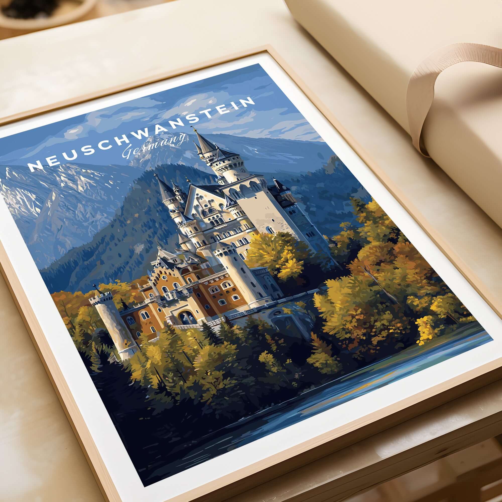 Neuschwanstein Castle Print | German Home Decor Poster displayed in a frame surrounded by autumn colors.