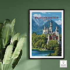 Neuschwanstein Poster - Bavarian Alps Castle View Print | Germany Wall Art displayed on a green wall with plants.