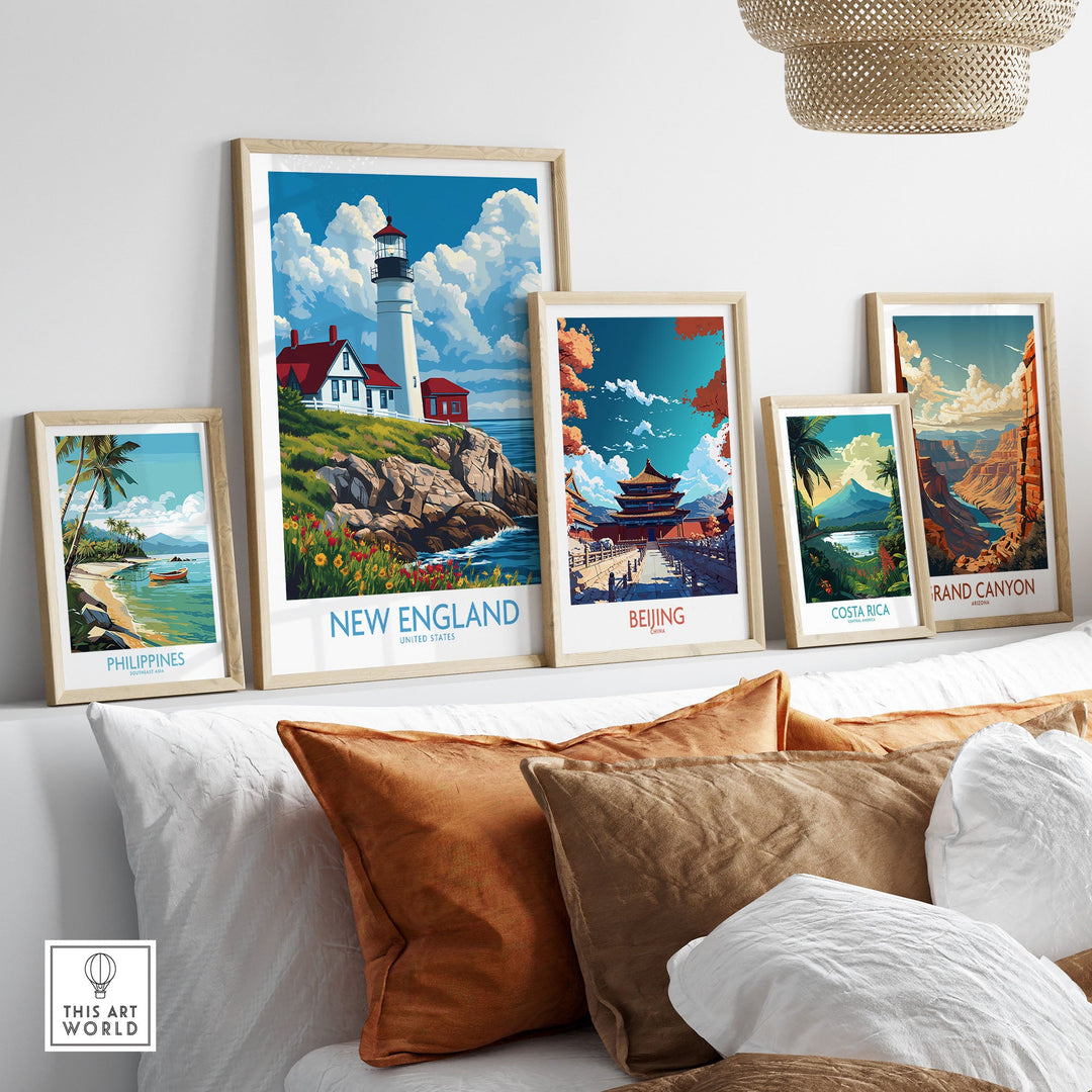 New England poster displayed among other travel-themed wall art in a cozy living room setting.