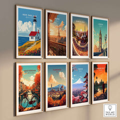 New England Wall Art featuring a charming lighthouse among vibrant city travel posters on display.