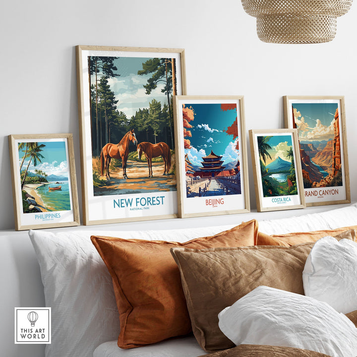 New Forest Print National Park poster with horses displayed among various travel art prints in a cozy living room setting.