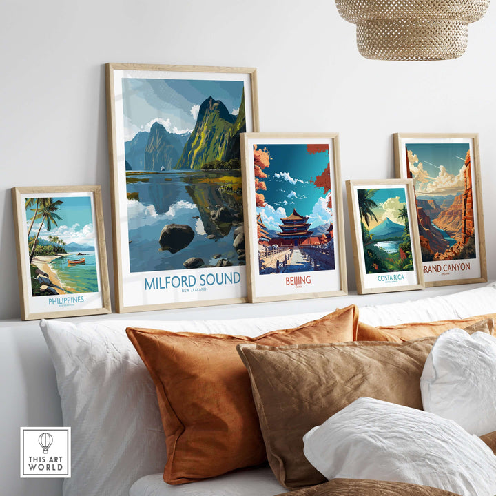 Gallery of travel posters including Milford Sound and landscapes from around the world, displayed in a modern living room.