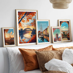 Newcastle Print England showcased with vibrant framed artworks on a stylish bedroom wall.