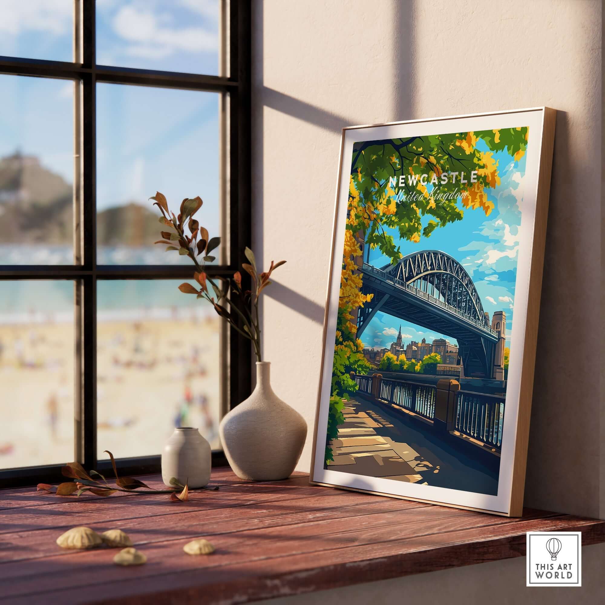 Newcastle upon Tyne Travel Print displayed in a bright room with a view of the beach and a bridge.