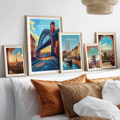 Newcastle Wall Art Poster displayed among other travel art prints, showcasing the Tyne Bridge in a stylish interior setting.