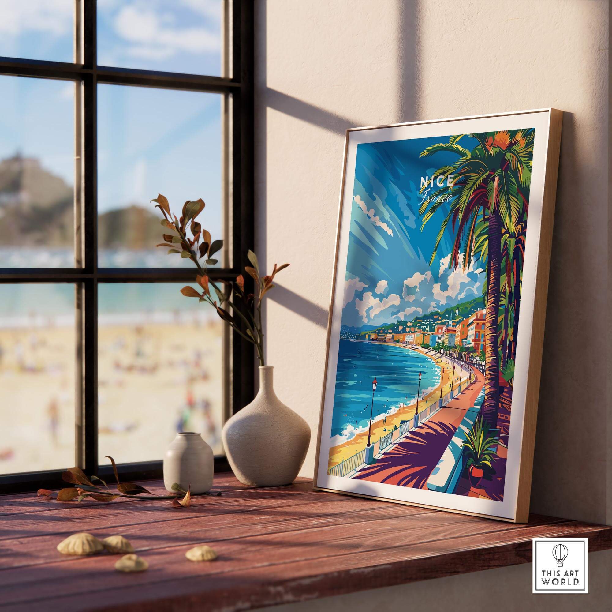 Nice Wall Art Print - France displayed on a windowsill, showcasing the vibrant beauty of the South of France.
