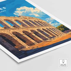 Nimes France Travel Print showcasing the iconic amphitheater, vibrant blue sky, and detailed architectural design.