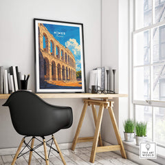 Nimes France Travel Print displayed in a modern home office setting showcasing charming architecture.