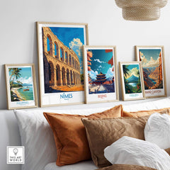 Nimes France Wall Art Print displayed among travel posters in a modern living room setting.