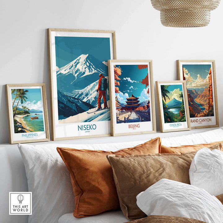 Collection of framed art prints including Niseko ski poster, showcasing travel destinations like Japan, Beijing, and Grand Canyon.