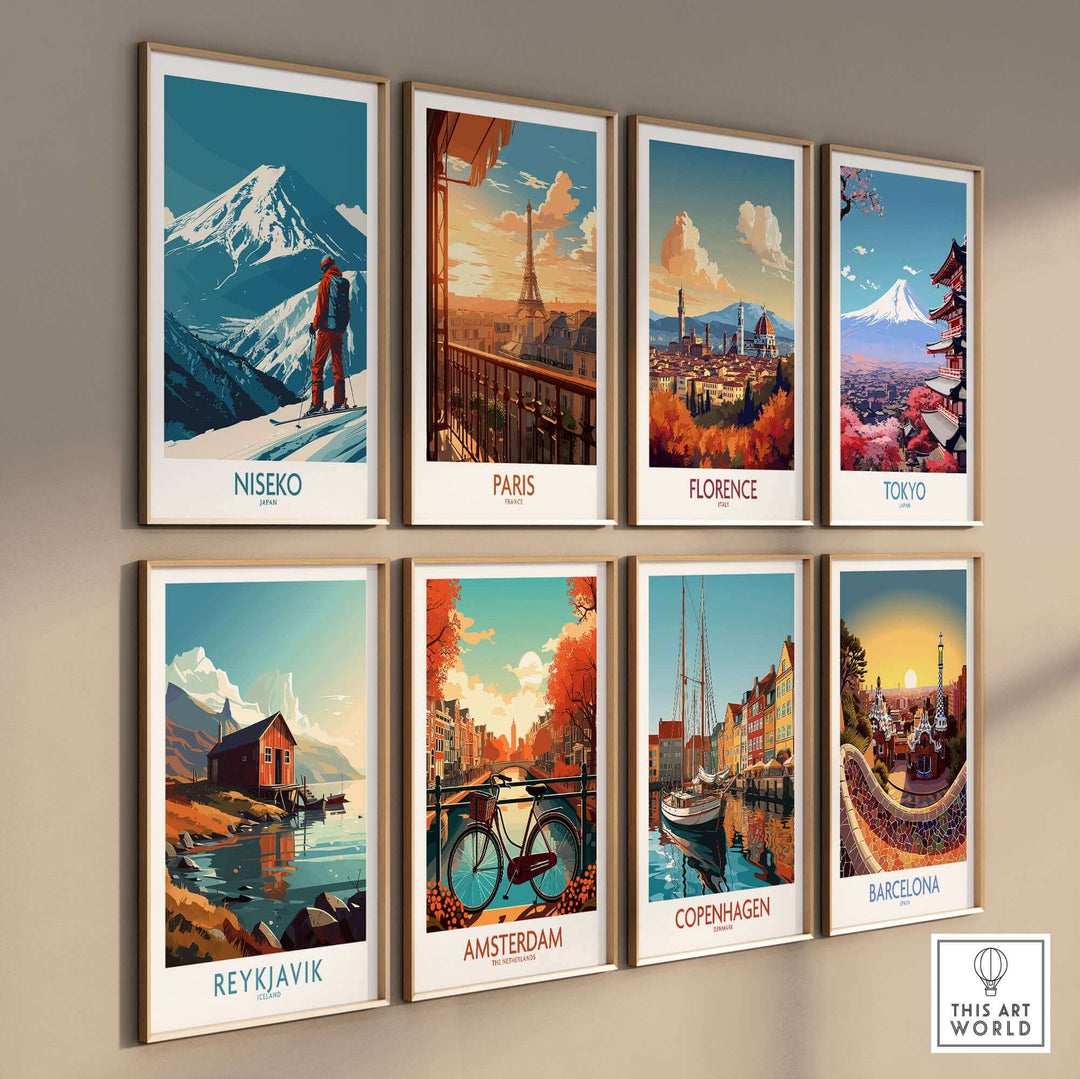 Wall display of travel art prints featuring cities like Niseko, Paris, Florence, Tokyo, Reykjavik, Amsterdam, Copenhagen, and Barcelona.