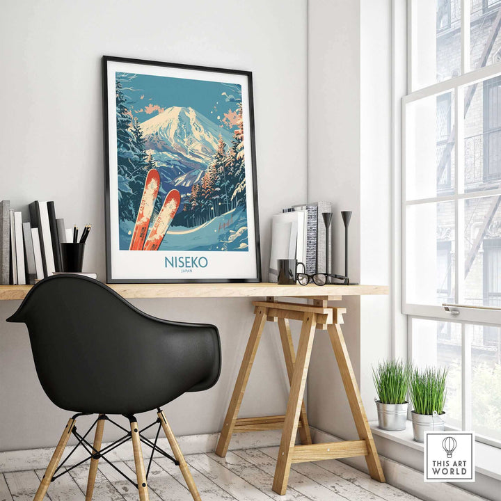 Stylish room featuring framed Niseko Japan poster with snowy mountain and ski-themed artwork on a modern desk setup.