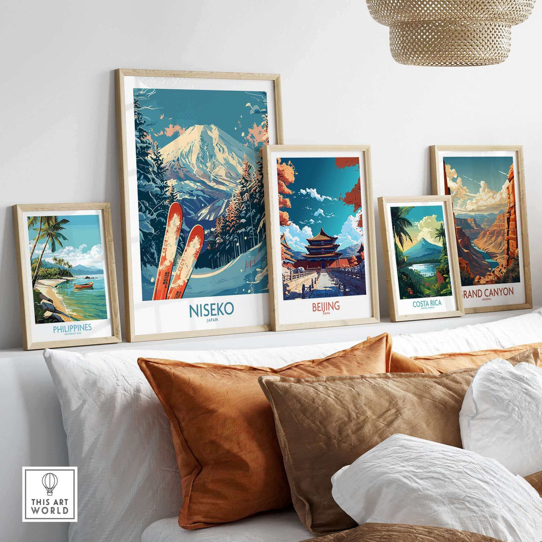 Gallery wall featuring Niseko poster with skis and mountain view, alongside posters of Beijing, Philippines, Costa Rica, Grand Canyon.