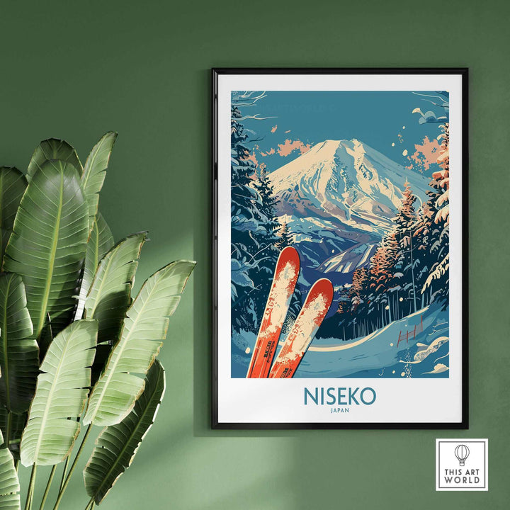 Retro Niseko Japan ski poster featuring snowy mountain landscape and red skis, framed and mounted on a green wall with tropical plants.