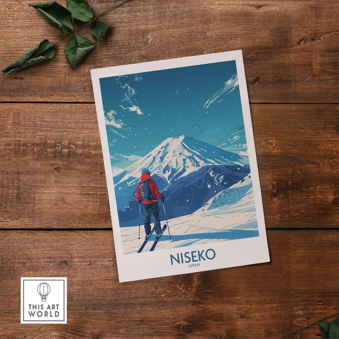 Niseko Ski Poster depicting a skier in Japan with snowy mountain backdrop on wooden surface.