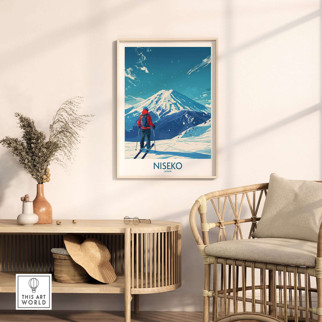 Framed Niseko Ski Poster featuring a skier and snow-covered Mount Yotei in Japan, displayed on a cozy living room wall.