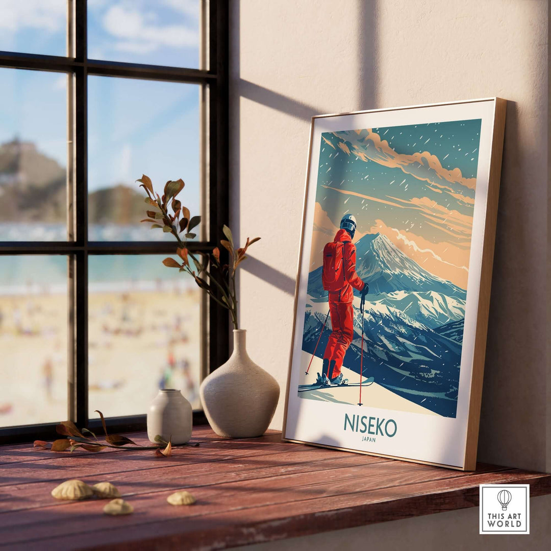 Niseko ski print showcasing a skier in red gear against a stunning mountain backdrop, perfect for ski enthusiasts.