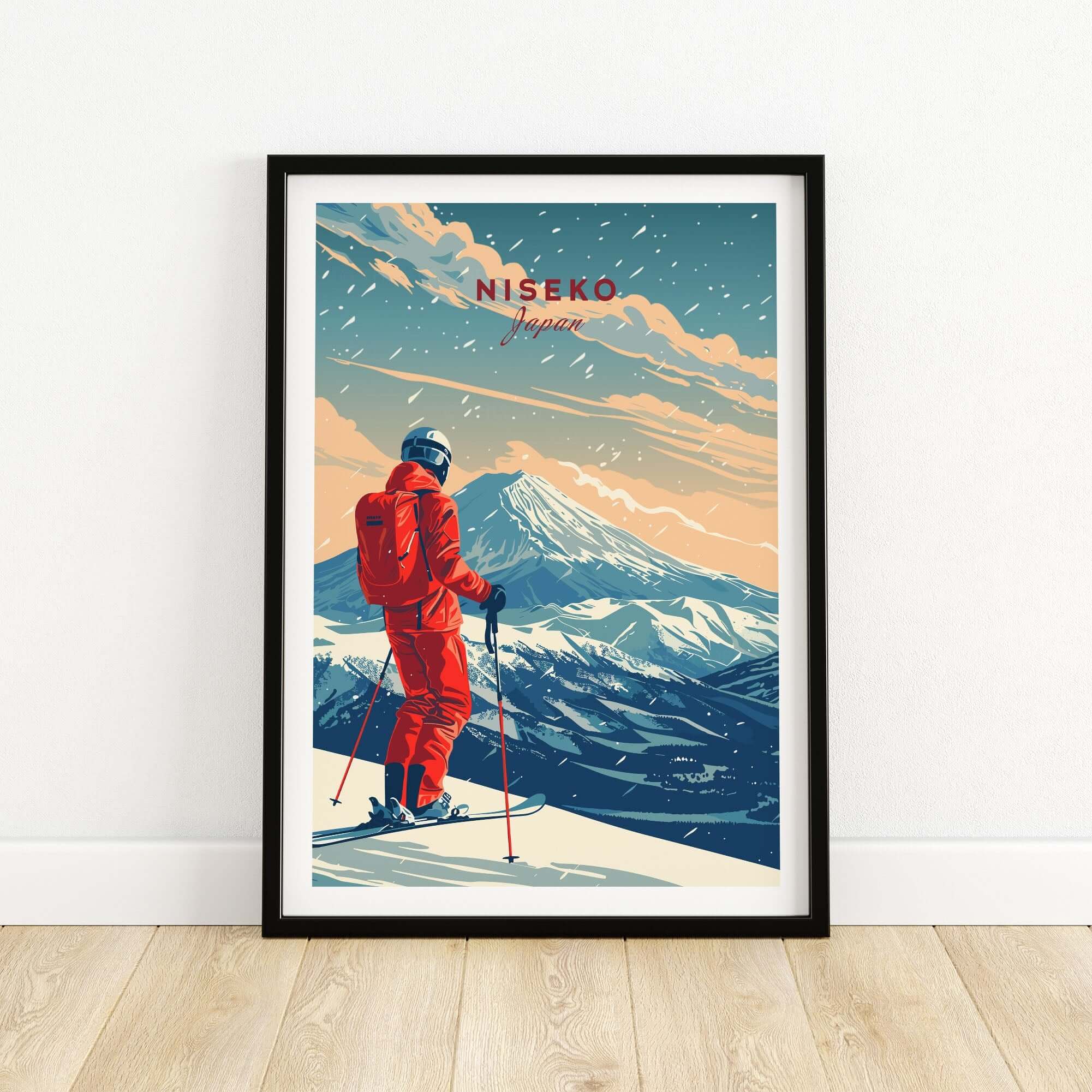 Niseko travel poster featuring a skier in red gear against a backdrop of snow-covered mountains in Japan.