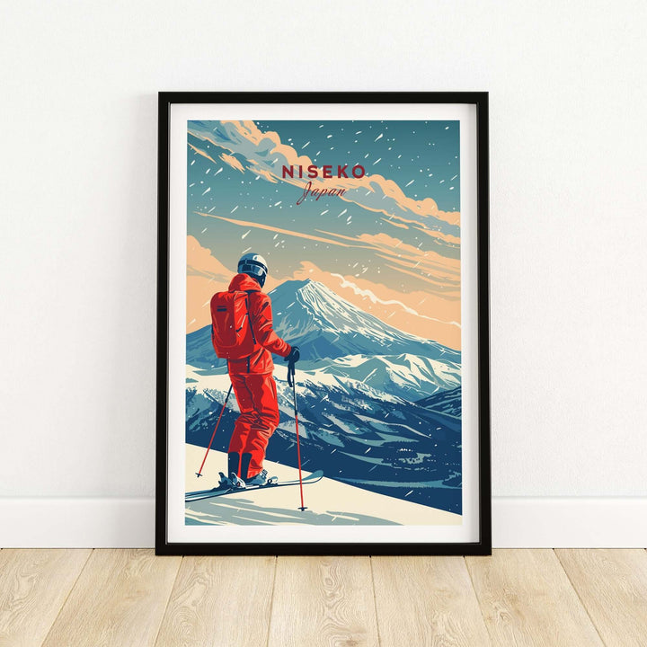 Niseko travel poster featuring a skier in red gear against a backdrop of snow-covered mountains in Japan.