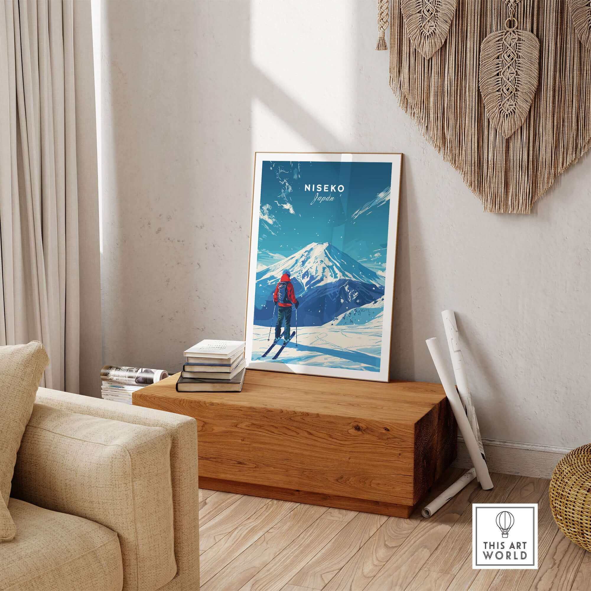 Niseko Travel Print featuring a skier with a view of a snowy mountain, displayed in a cozy living room setting.