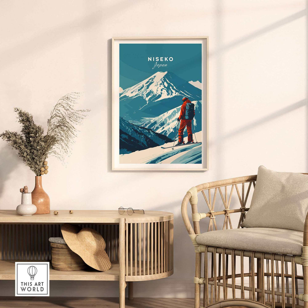 Niseko Japan ski poster wall art featuring skier and mountain, framed in a cozy room with modern decor and rattan furniture.